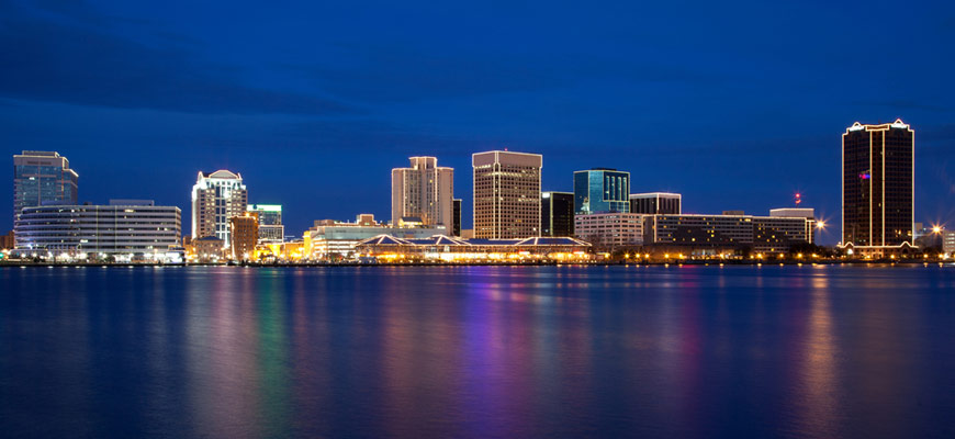 Norfolk at night, we serve the entire Commonwealth of Virginia and beyond to the United States